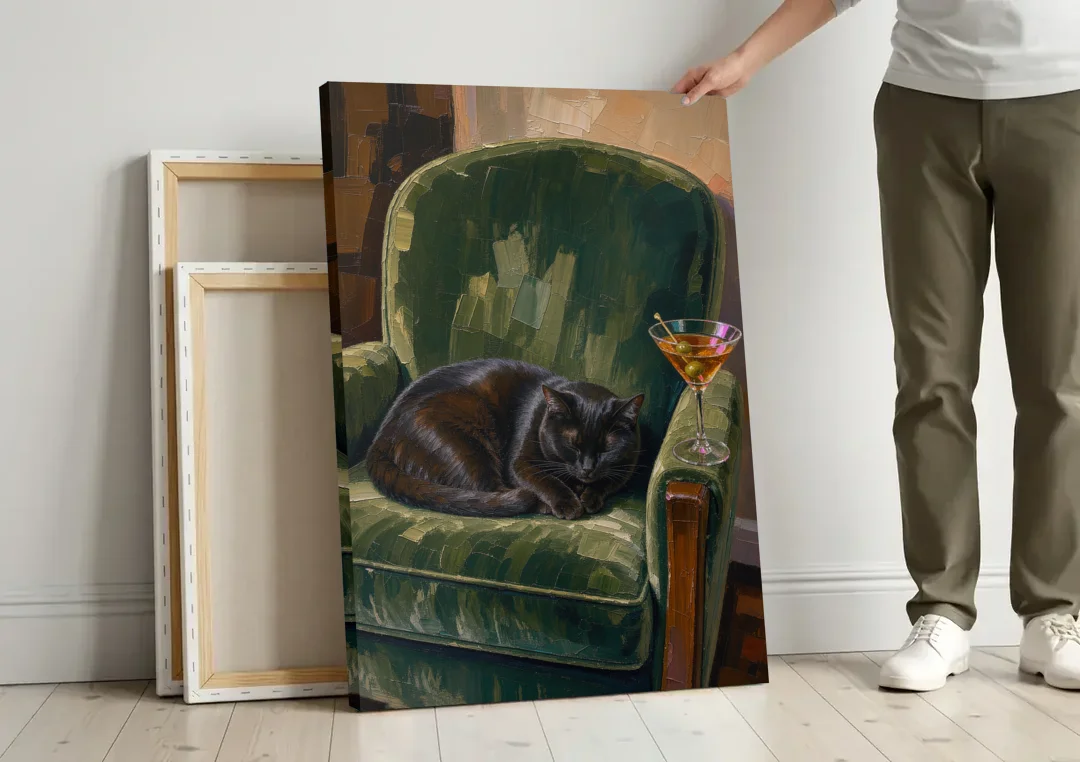 Lounge Wall Art with a Black Cat and Martini canvas wall art leaning against a wall next to blank canvases