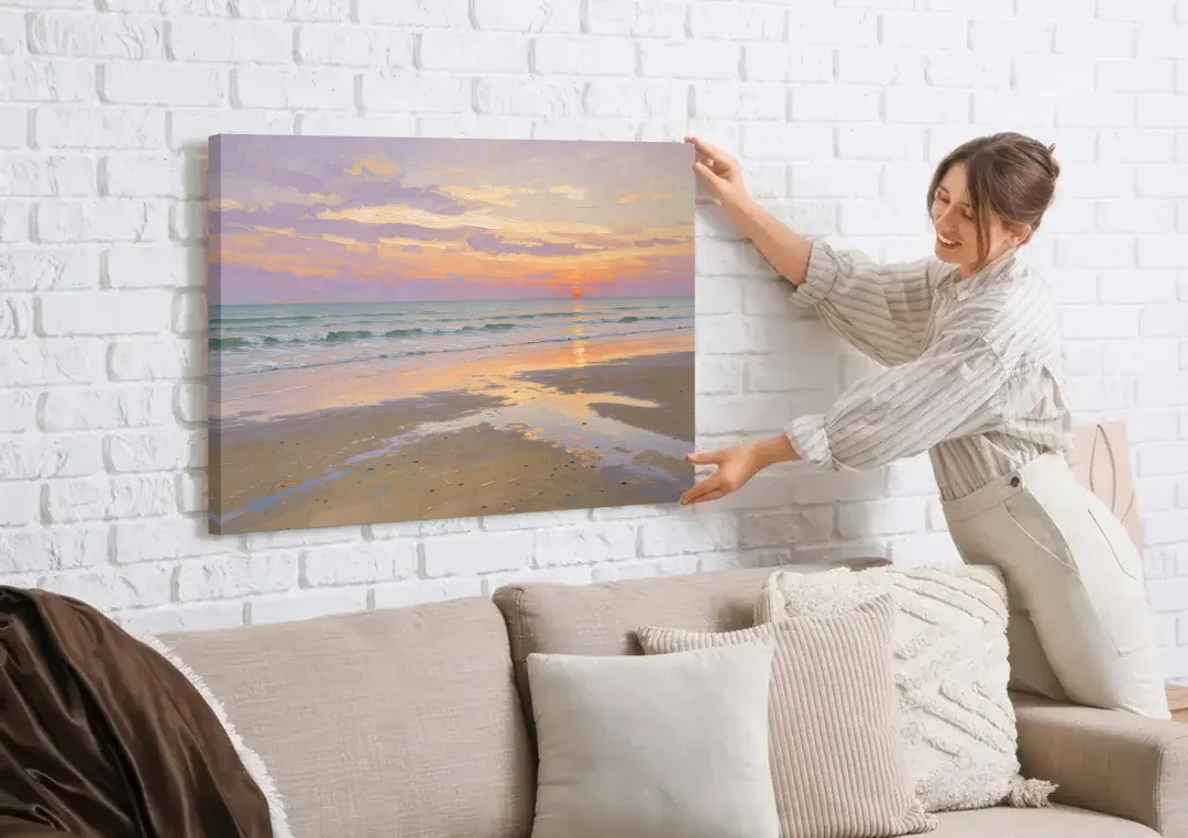 Low Tide Sunset with Lavender Sky canvas wall art being hung on a white brick wall above a sofa