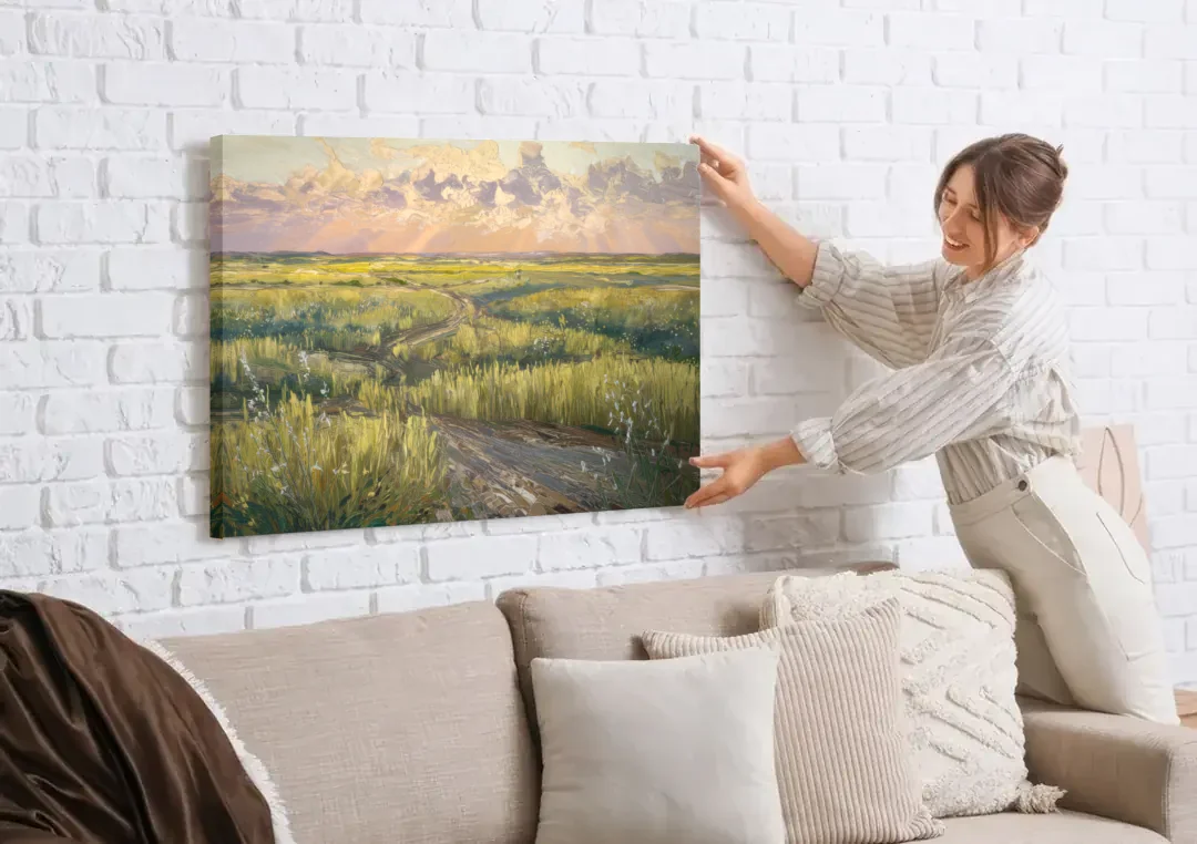 Lubbock Prairie Landscape canvas wall art being hung on a white brick wall above a sofa
