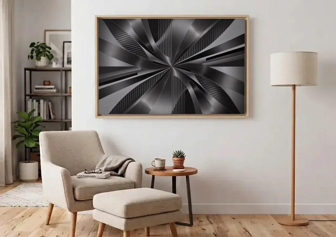 Luxurious Fluidity Black and Grey Abstract canvas wall art above an armchair in a bright living room