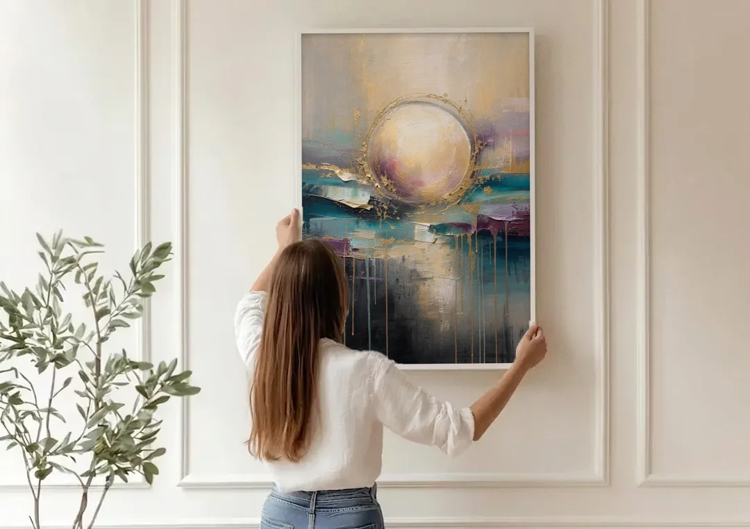 Luxury Abstract Gilded Moonrise Over Teal canvas wall art being hung on a paneled wall