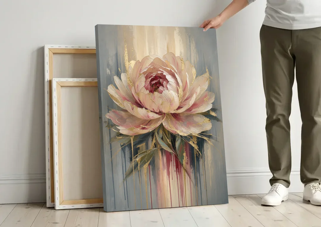 Luxury Gilded Blush Peony canvas wall art leaning against a wall next to blank canvases