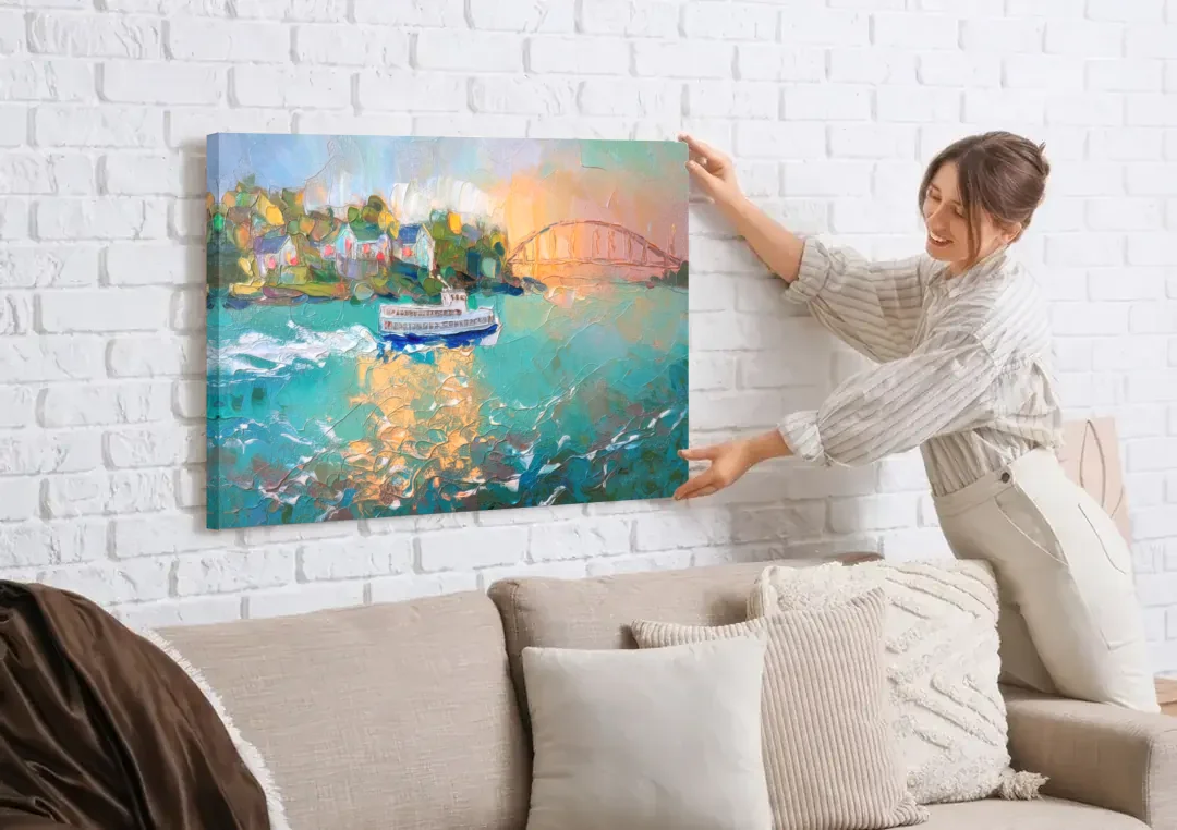Mackinac Island Ferry Crossing canvas wall art being hung on a white brick wall above a sofa