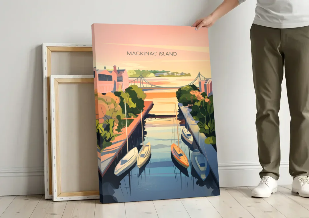 Mackinac Island Sunrise Harbor canvas wall art leaning against a wall next to blank canvases