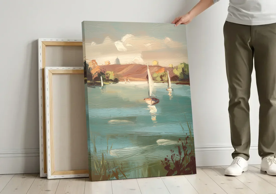 Madison Lake Mendota Serenity canvas wall art leaning against a wall next to blank canvases