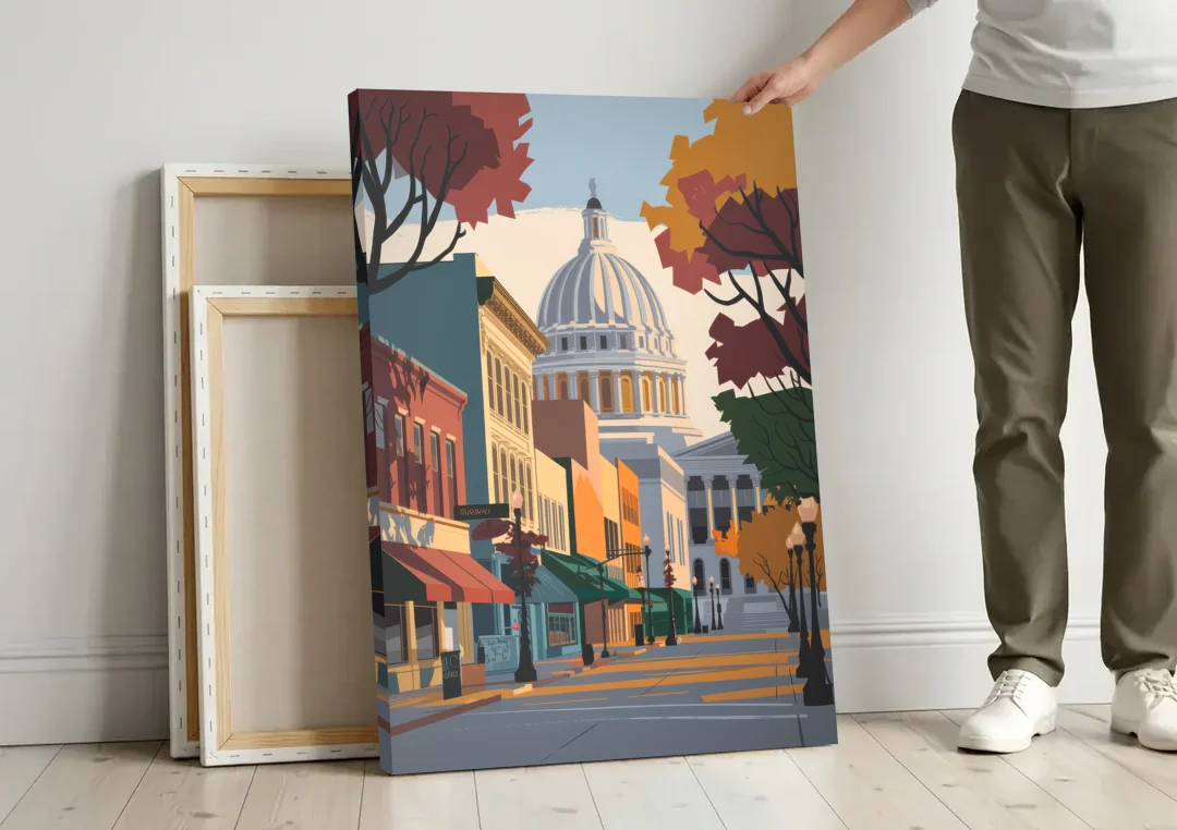 Madison State Street Vibes canvas wall art leaning against a wall next to blank canvases