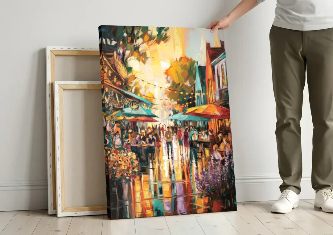 Madison Summer Festival Scene canvas wall art leaning against a wall next to blank canvases
