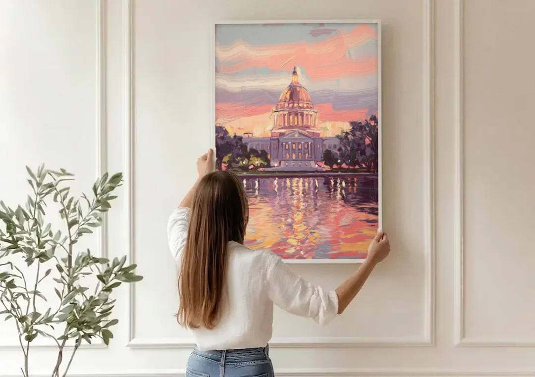Madison Sunset Over Capitol canvas wall art being hung on a paneled wall