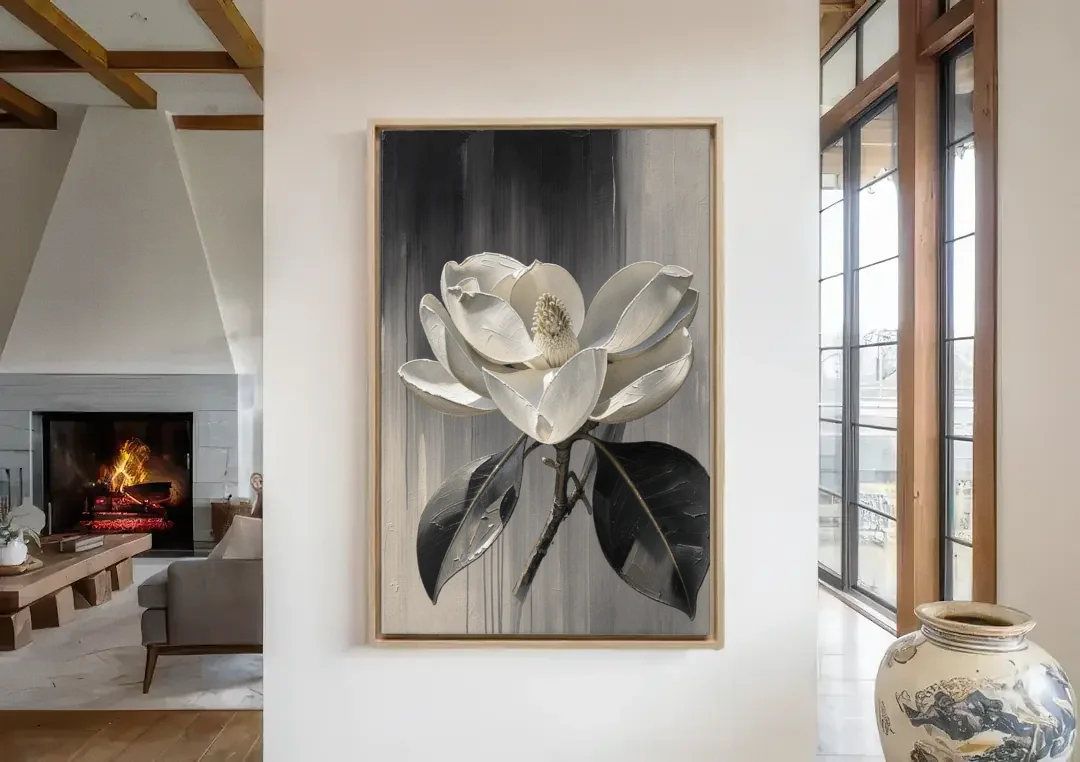 Magnolia Canvas Art with a Single White Bloom canvas wall art in a living room with a fireplace