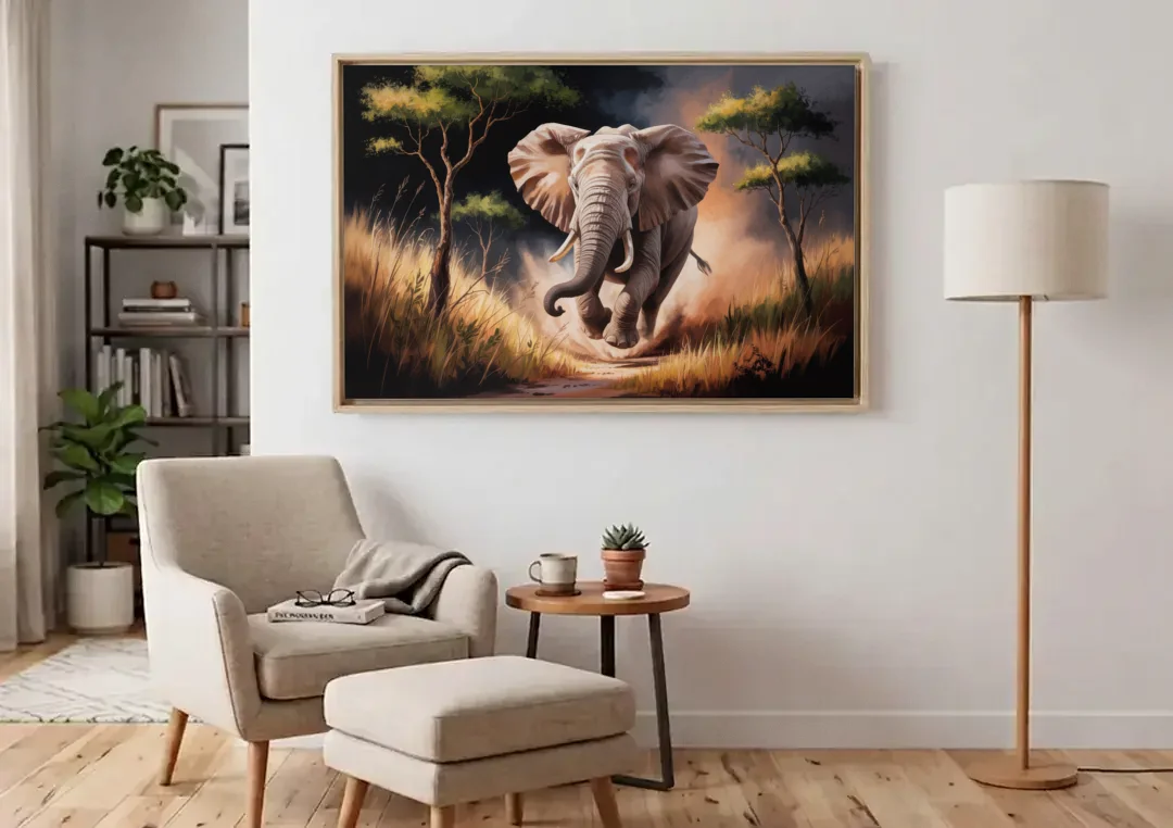 Majestic Elephant Charge canvas wall art above an armchair in a bright living room