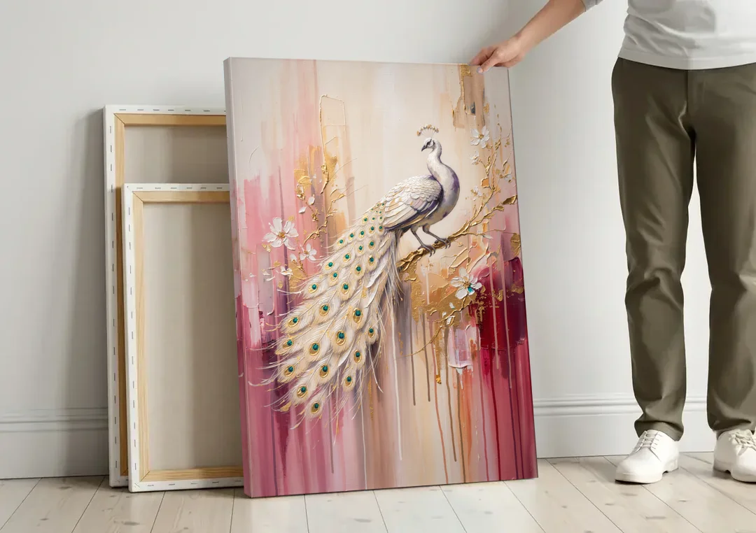 Majestic Peacock Elegance White and Gold canvas wall art leaning against a wall next to blank canvases