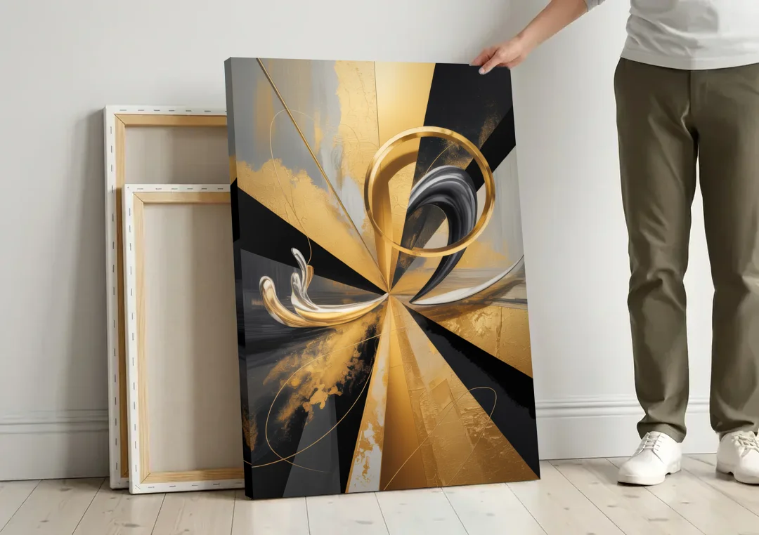 Majestic Symmetry Black and Gold Abstract canvas wall art leaning against a wall next to blank canvases