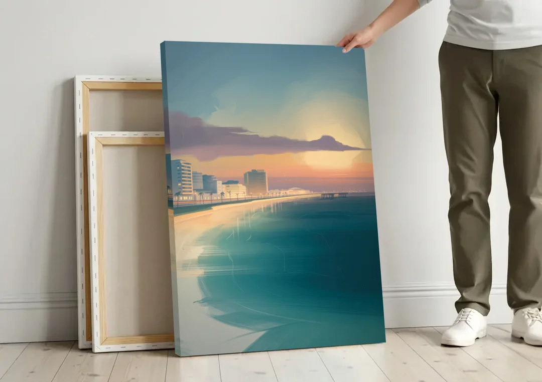 Malecón Tajamar Sunset canvas wall art leaning against a wall next to blank canvases