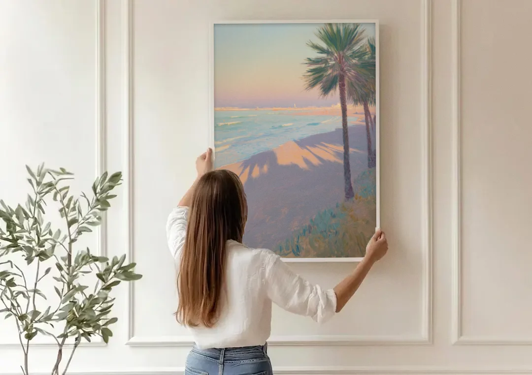 Malvarrosa Beach canvas wall art being hung on a paneled wall