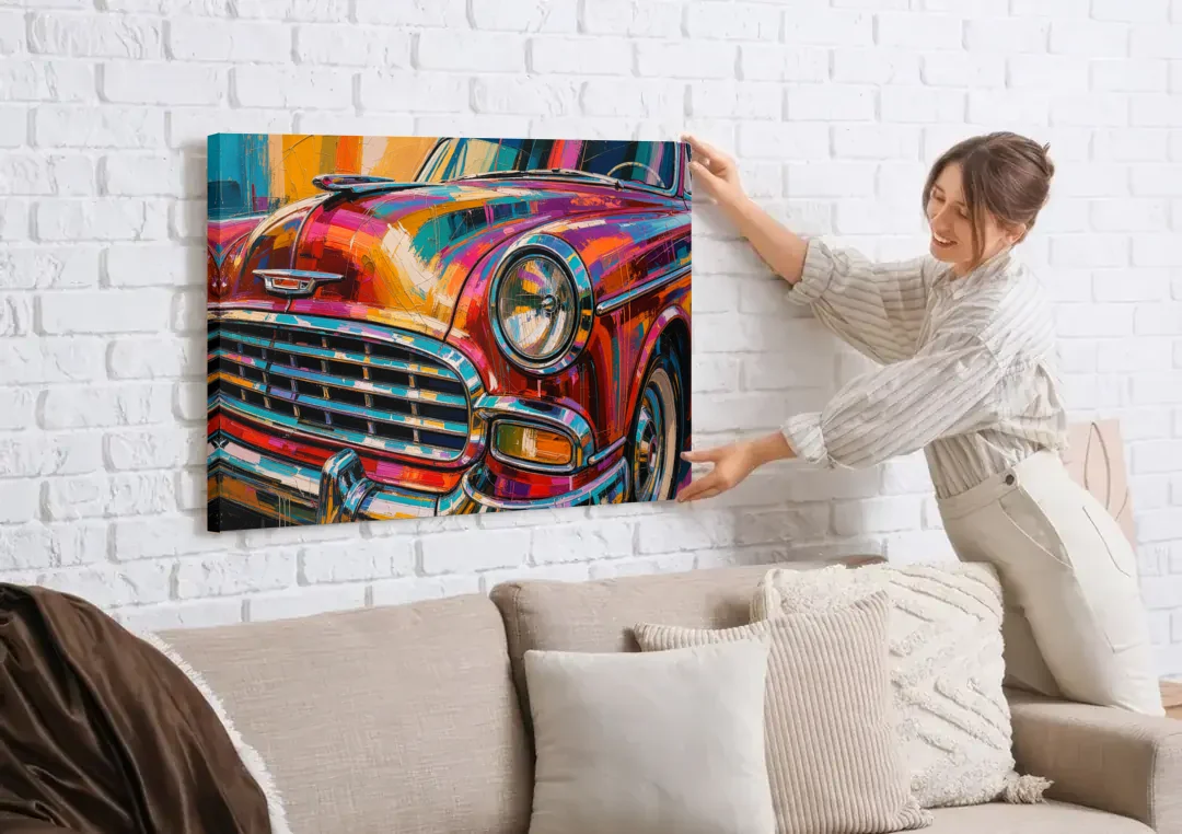 Man Cave Decor Chrome Grille and Headlight canvas wall art being hung on a white brick wall above a sofa