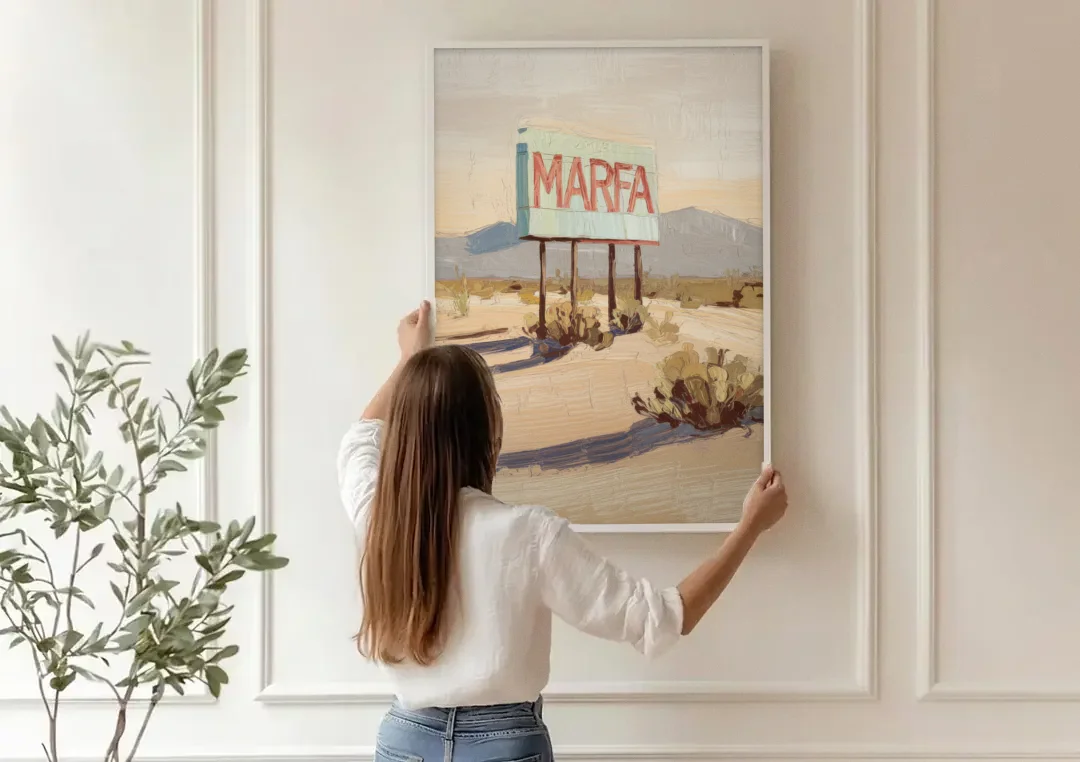 Marfa Iconic Sign canvas wall art being hung on a paneled wall