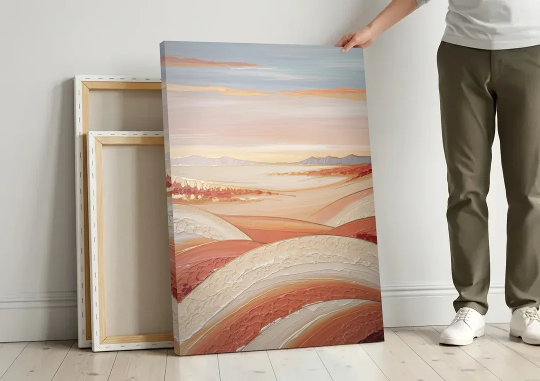 Marfa Texas Horizon canvas wall art leaning against a wall next to blank canvases