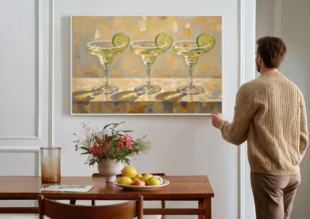 Margarita Painting Trio with Lime Wheels canvas wall art above a dining table