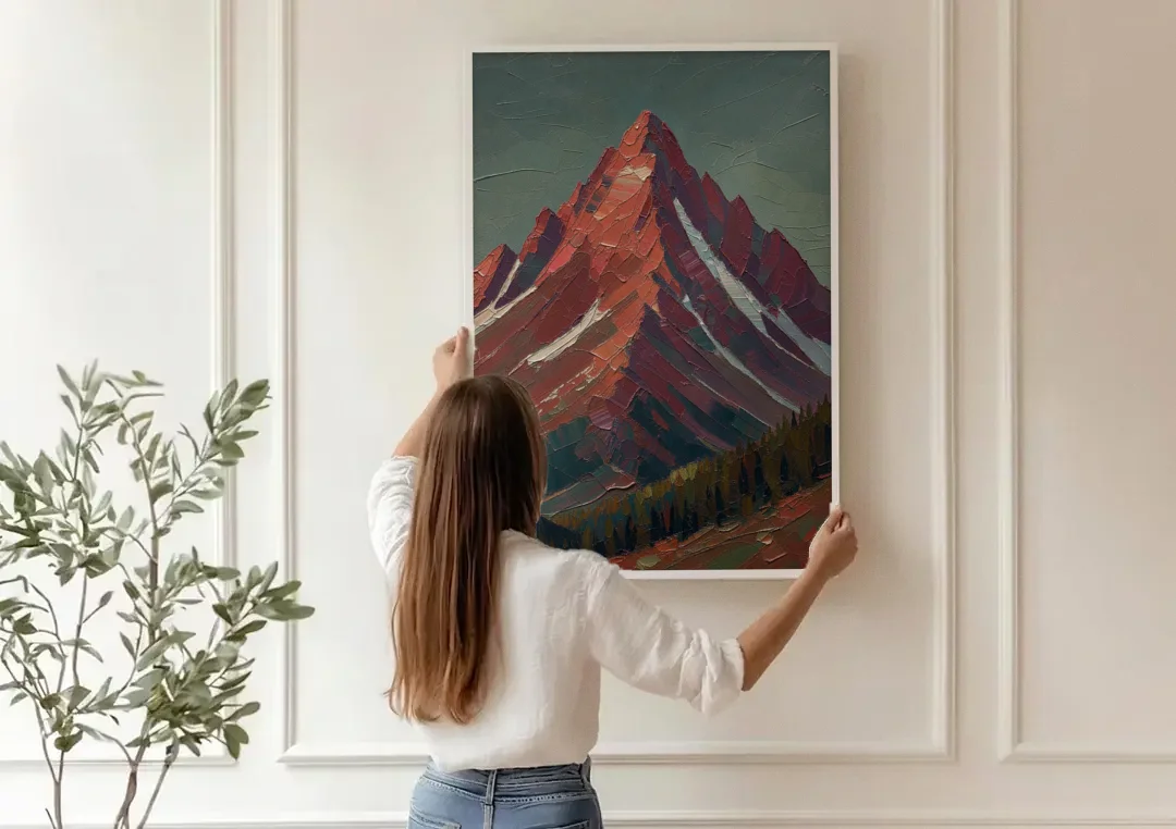 Maroon Wall Art of a Mountain Peak at Dusk canvas wall art being hung on a paneled wall