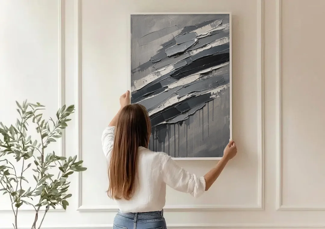 Masculine Abstract Slate Strata with White Seams canvas wall art being hung on a paneled wall