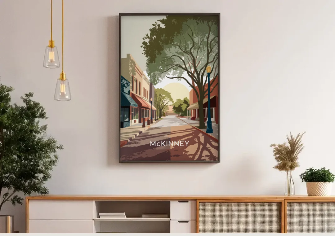McKinney Artistic Heritage canvas wall art above a wooden sideboard under pendant lights