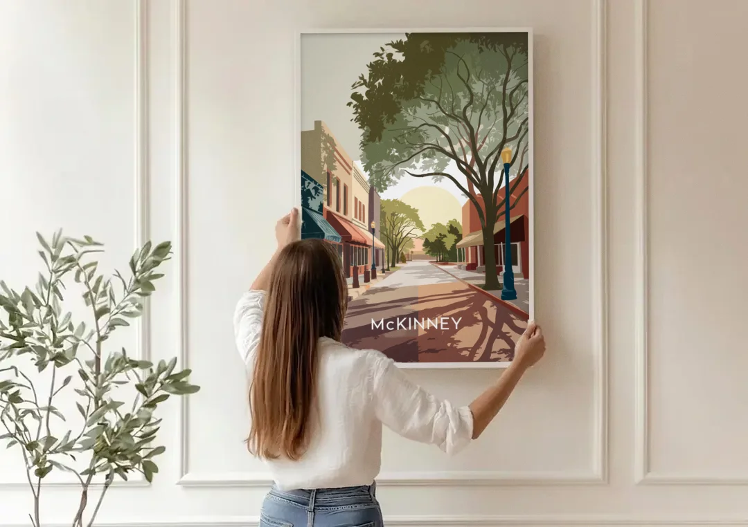 McKinney Artistic Heritage canvas wall art being hung on a paneled wall