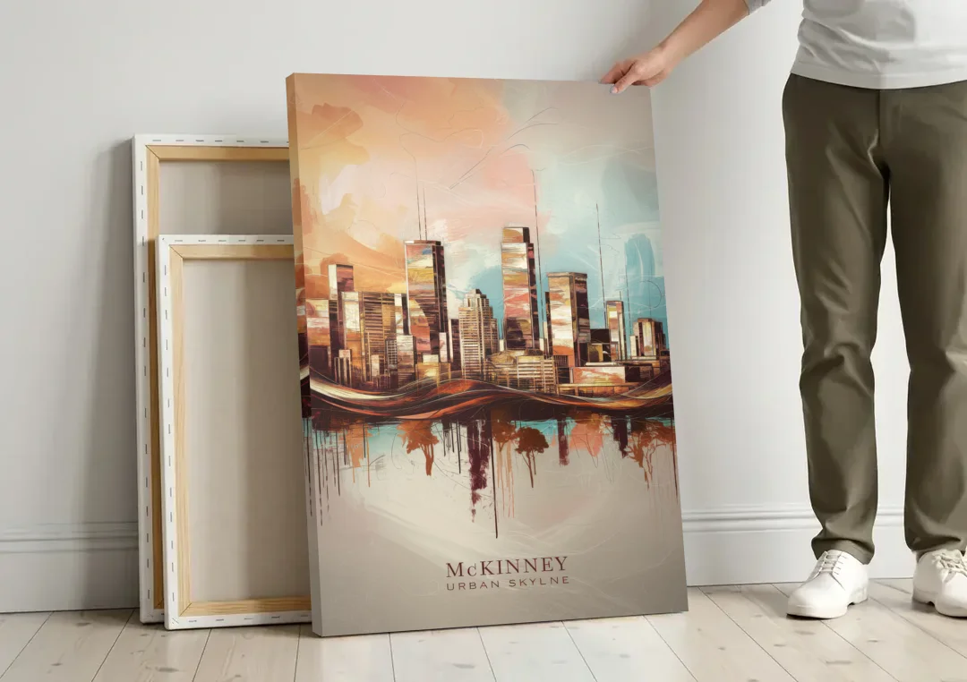 McKinney Urban Skyline canvas wall art leaning against a wall next to blank canvases