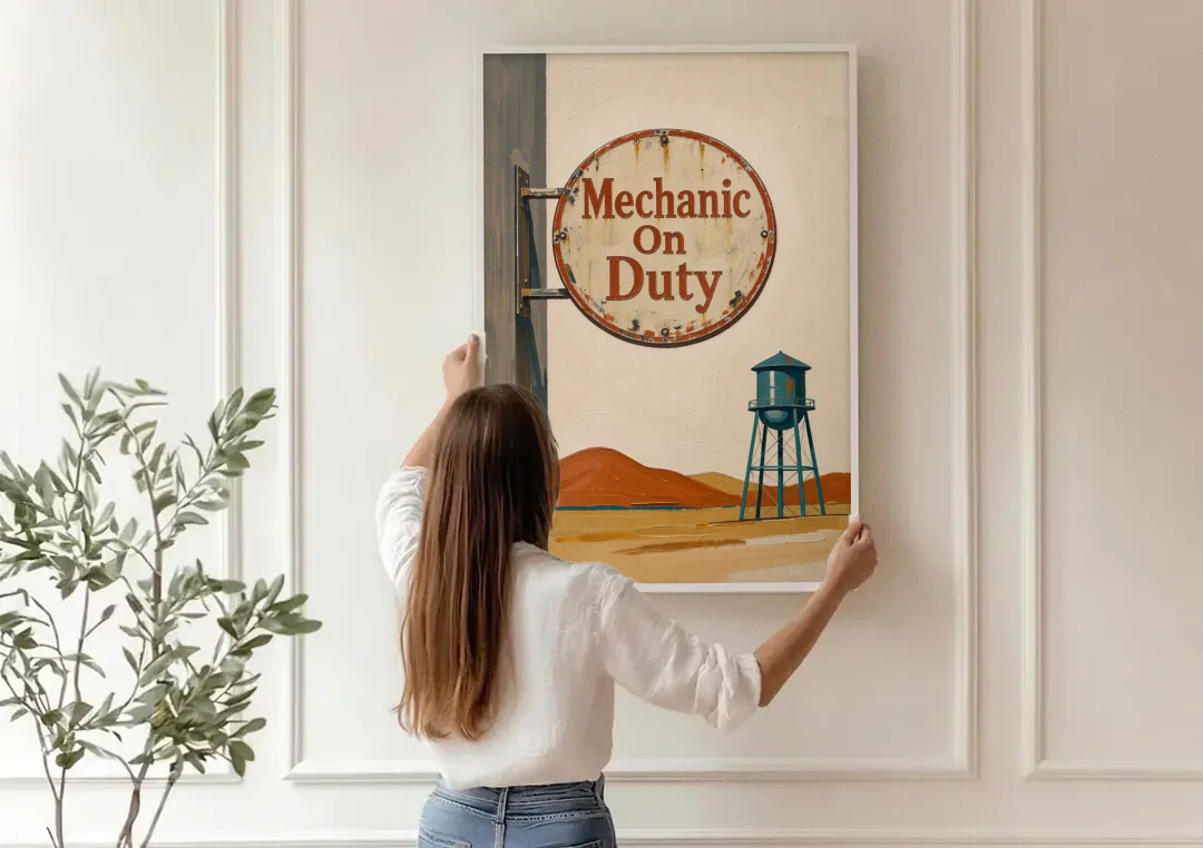 Mechanic Shop Decor with a Desert Water Tower canvas wall art being hung on a paneled wall