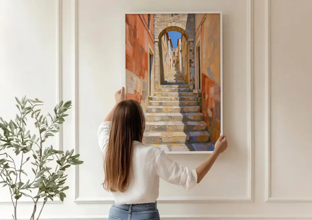 Mediterranean Wall Decor with Sunlit Steps to an Arch canvas wall art being hung on a paneled wall