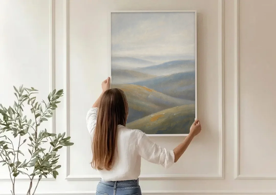 Meeting Room Decor with Misty Rolling Hills canvas wall art being hung on a paneled wall