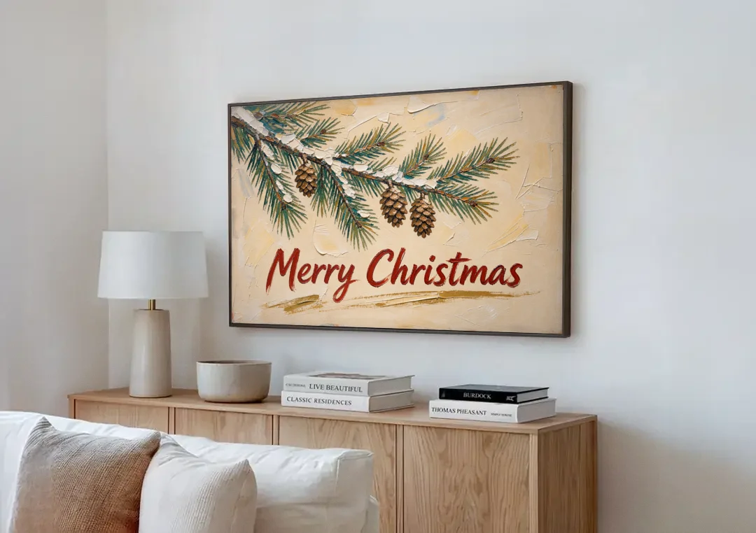 Merry Christmas Painting with Snowy Pine Bough canvas wall art above a wooden sideboard next to a sofa