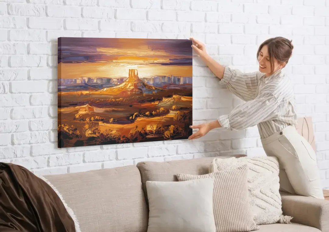 Mesa Sunlit Horizons canvas wall art being hung on a white brick wall above a sofa