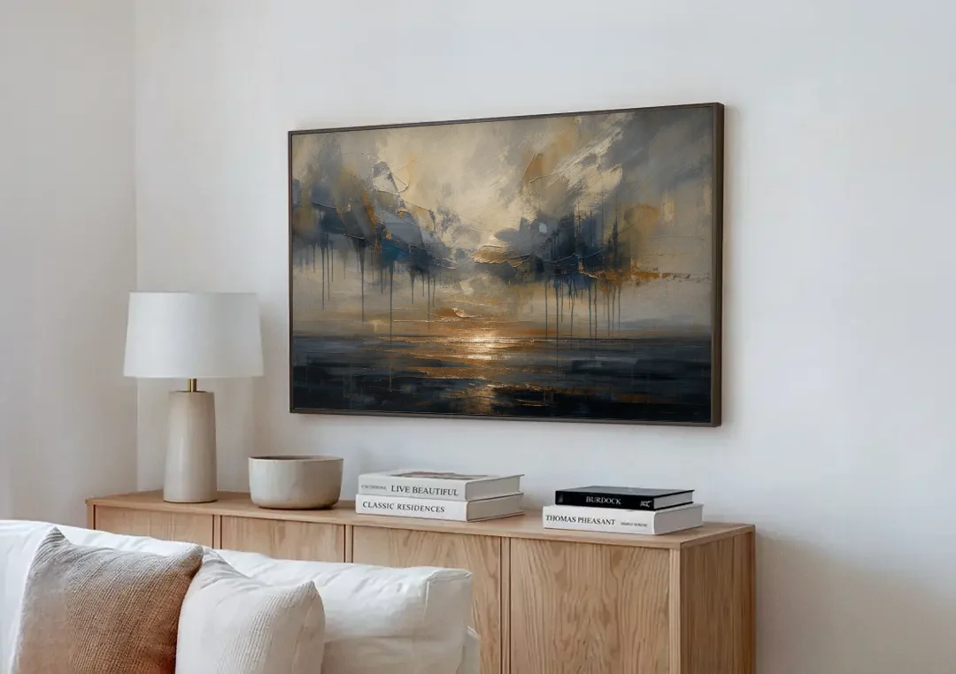 Metallic Abstract Bronze Horizon Over Still Sea canvas wall art above a wooden sideboard next to a sofa