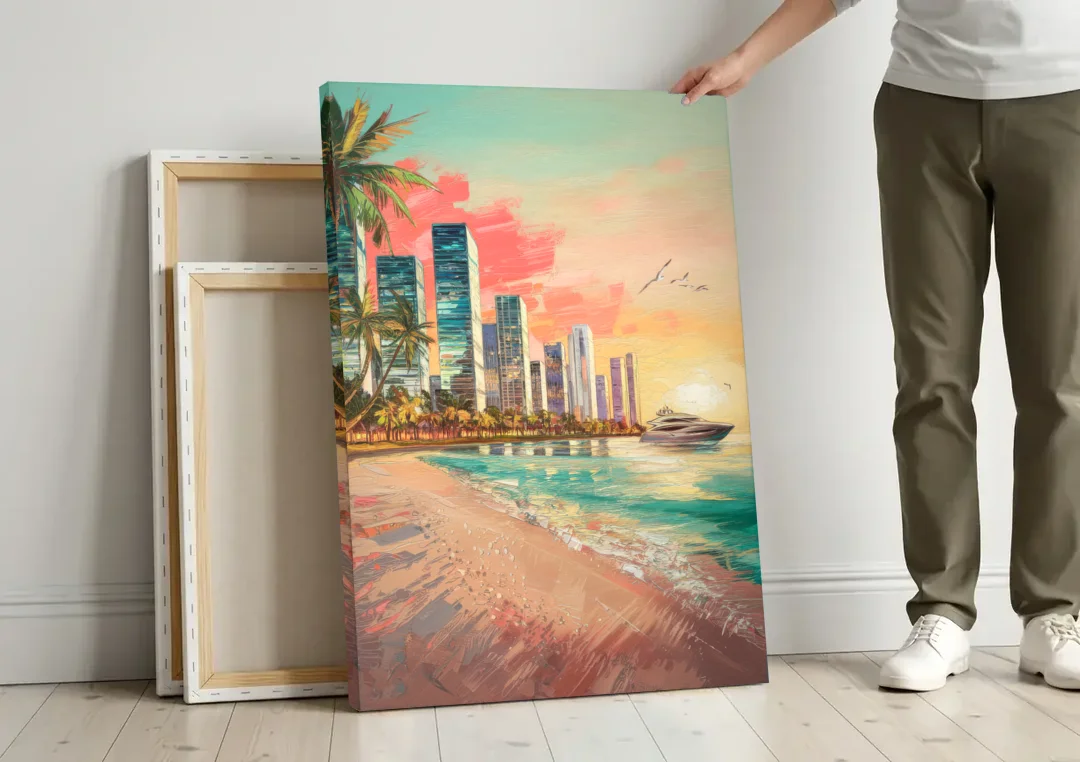Miami Beachfront Horizon canvas wall art leaning against a wall next to blank canvases
