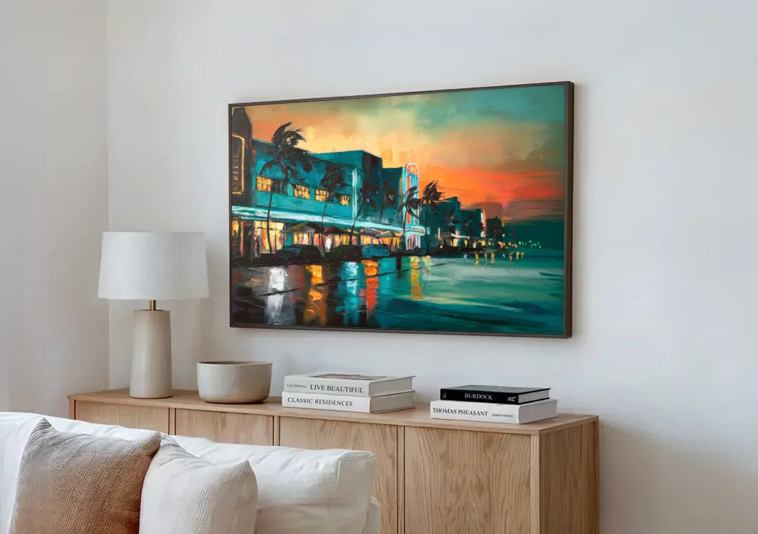 Miami Ocean Drive Lights canvas wall art above a wooden sideboard next to a sofa