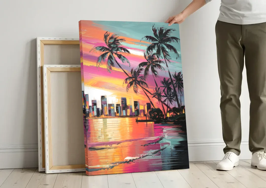 Miami Palm Trees and Sunset canvas wall art leaning against a wall next to blank canvases