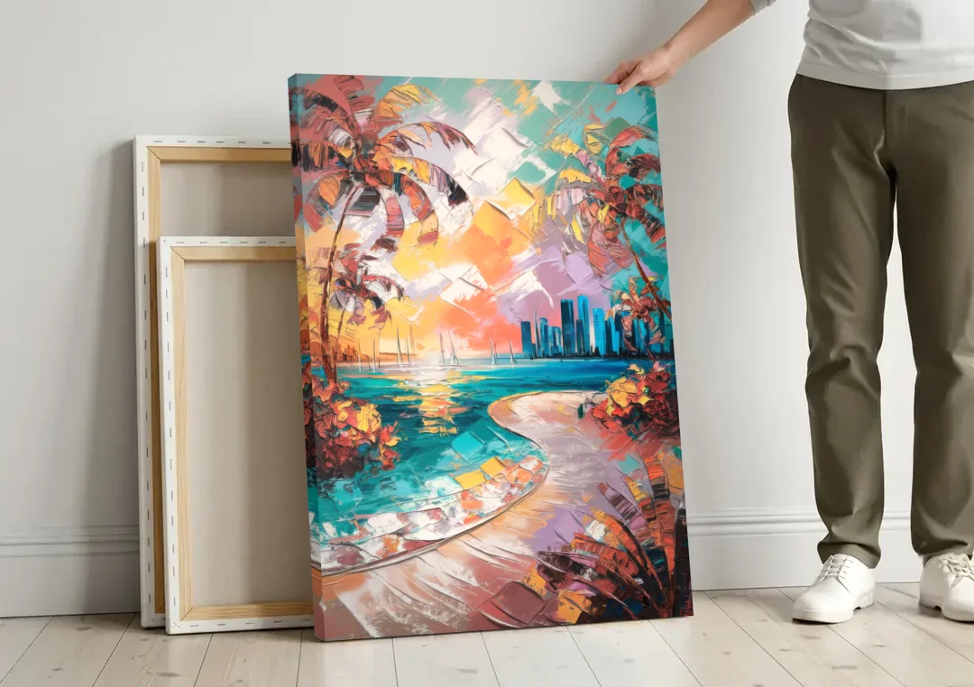 Miami Tropical Paradise canvas wall art leaning against a wall next to blank canvases