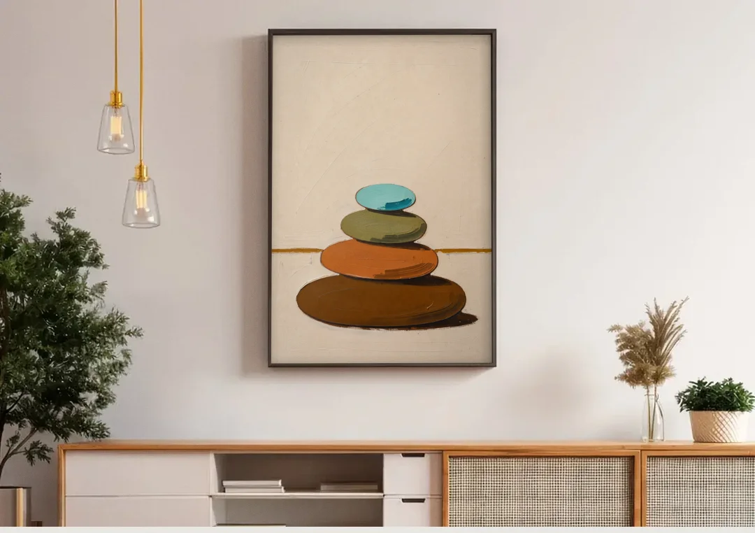 Mid Century Abstract Painting of a Leaning Pebble Cairn canvas wall art above a wooden sideboard under pendant lights
