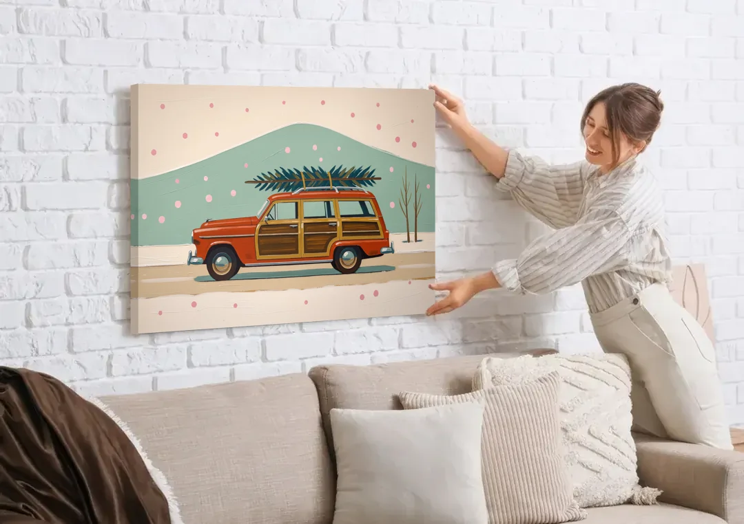 Mid Century Christmas Decor with a Woody Wagon canvas wall art being hung on a white brick wall above a sofa