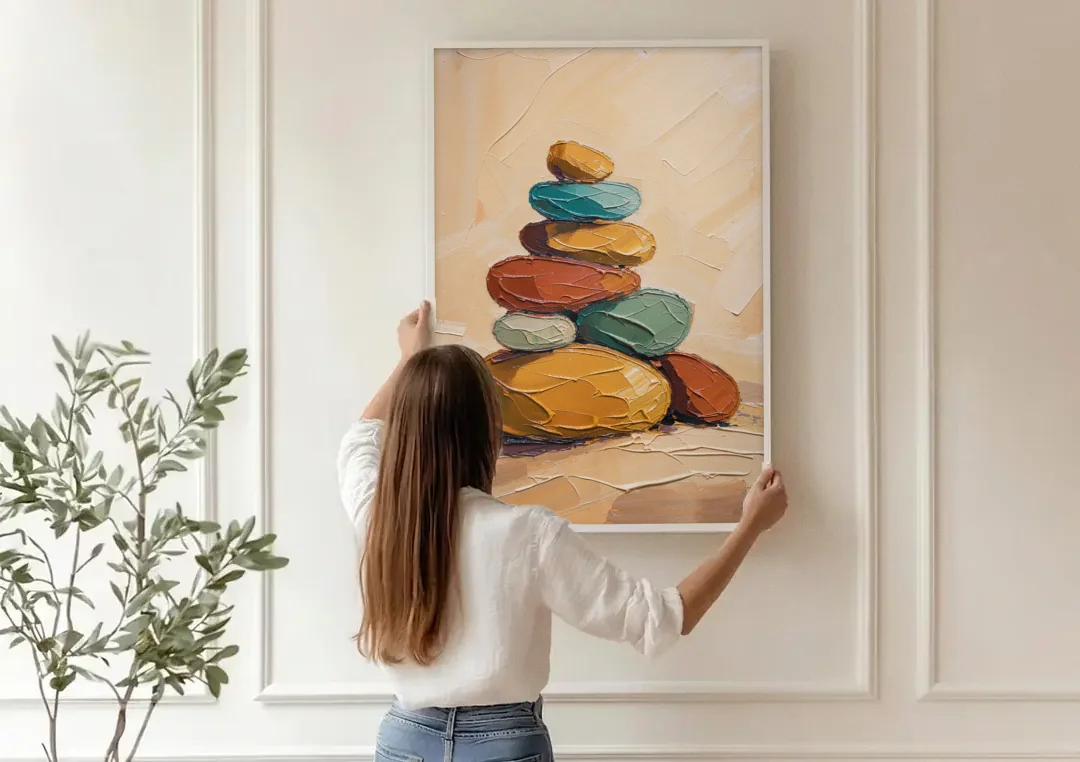 Mid Century Modern Abstract Ochre Pebble Cairn canvas wall art being hung on a paneled wall