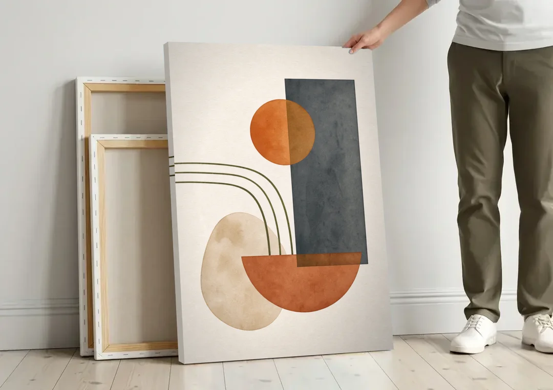 Mid Century Modern Abstract Painting with Slate Slab canvas wall art leaning against a wall next to blank canvases