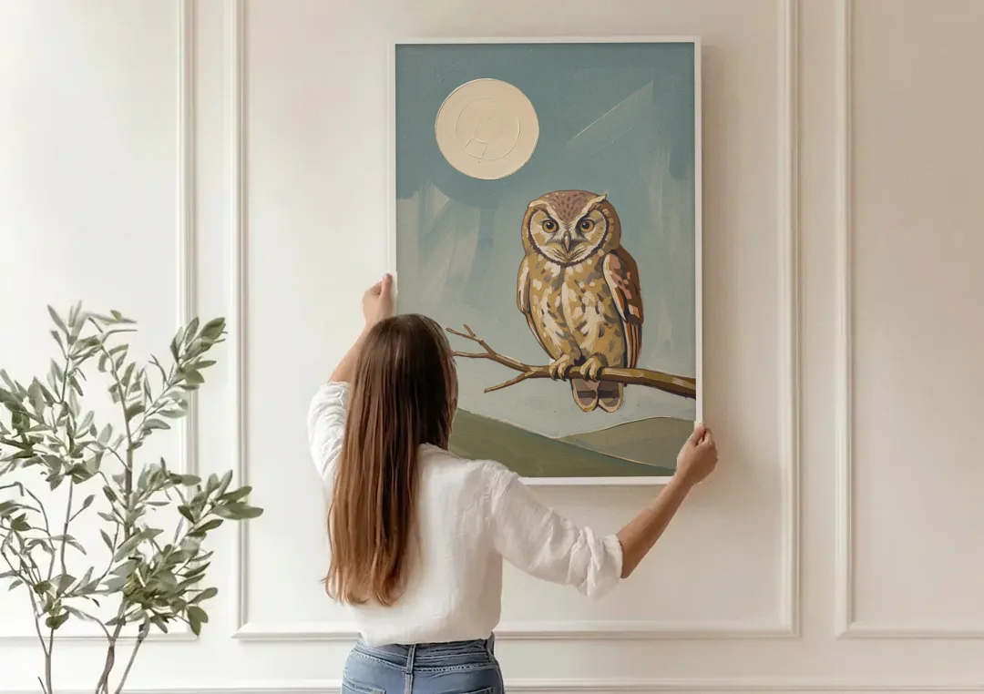 Mid Century Modern Gallery Wall Owl Under the Moon canvas wall art being hung on a paneled wall