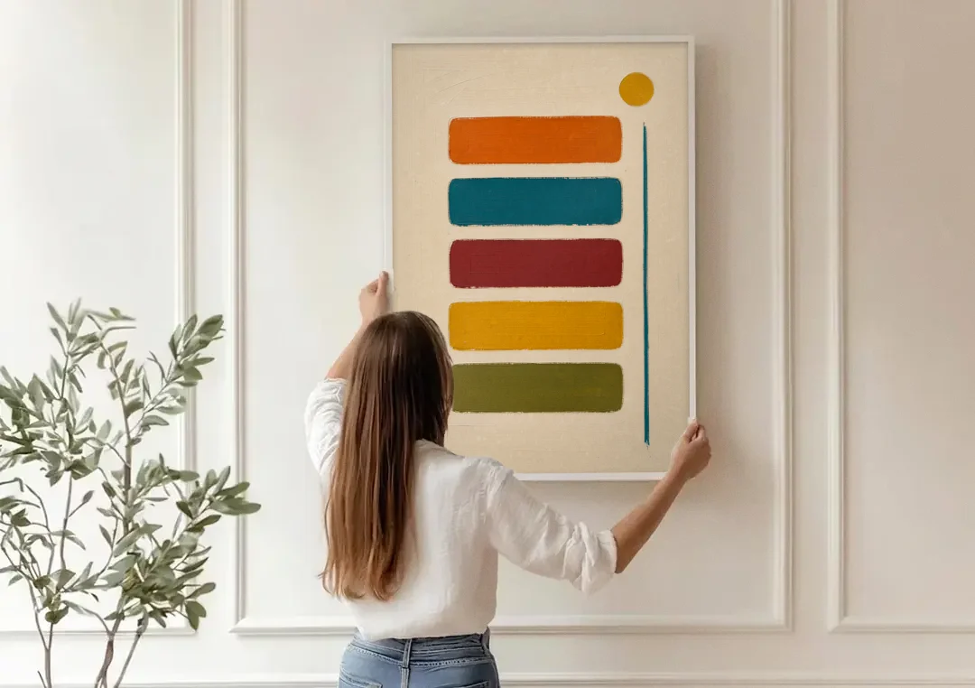 Mid Century Modern Home Decor with Five Stacked Swatches canvas wall art being hung on a paneled wall
