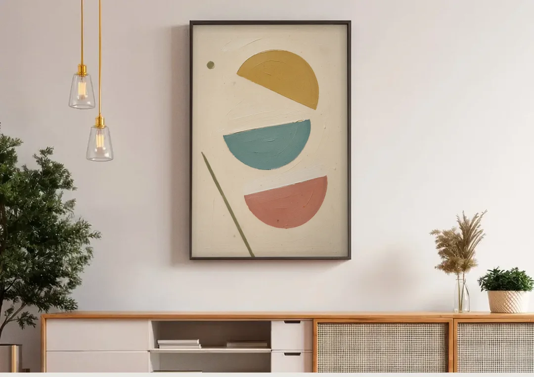 Mid Century Modern Prints of Three Tipping Half Moons canvas wall art above a wooden sideboard under pendant lights