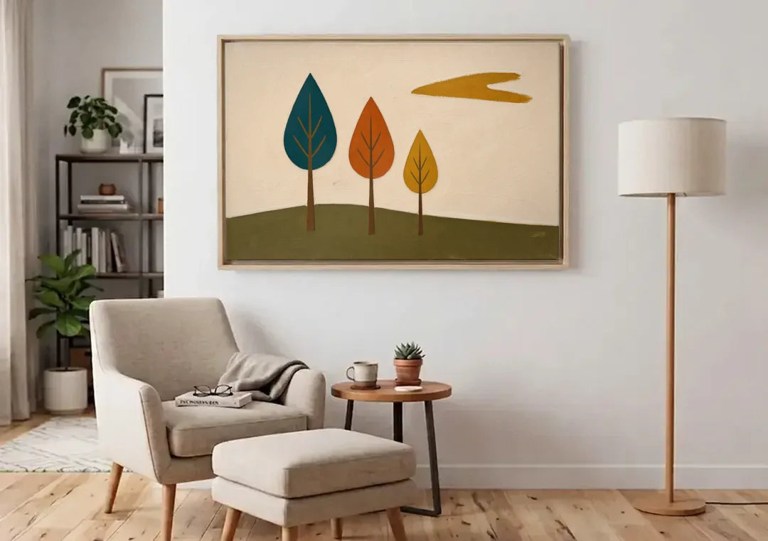 Mid Century Modern Wall Art of Three Trees canvas wall art above an armchair in a bright living room