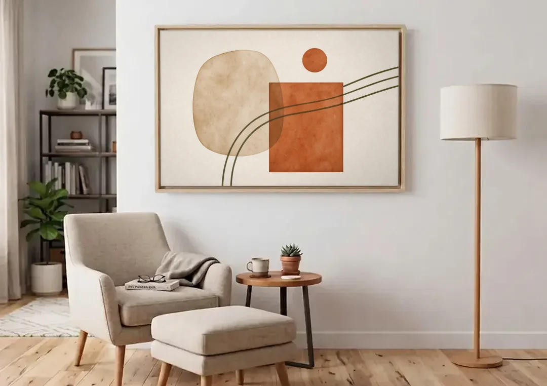 Mid Century Modern Wall Decor Pebble and Olive Arcs canvas wall art above an armchair in a bright living room