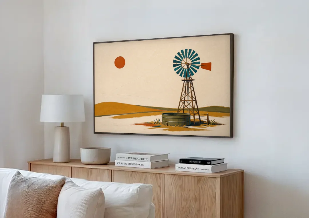 Mid Century Modern Western Art Windmill and Stock Tank canvas wall art above a wooden sideboard next to a sofa