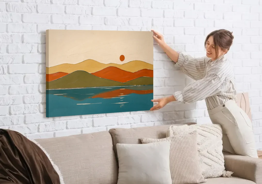 Mid Century Wall Art of Dome Hills at Sunrise canvas wall art being hung on a white brick wall above a sofa