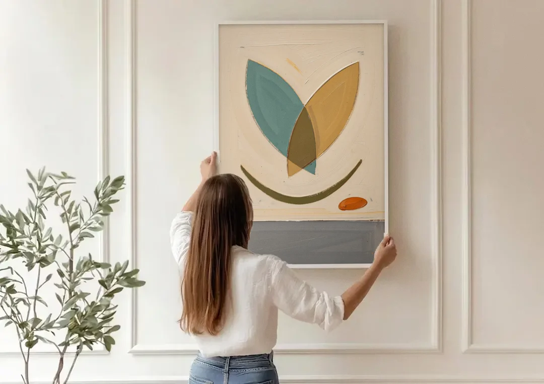 Mid Century Wall Decor with Teal and Ochre Leaves canvas wall art being hung on a paneled wall