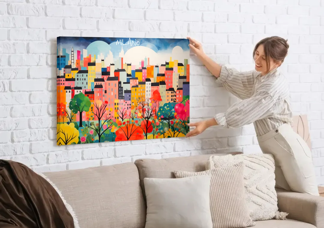 Milan Art of a Colorful Skyline canvas wall art being hung on a white brick wall above a sofa